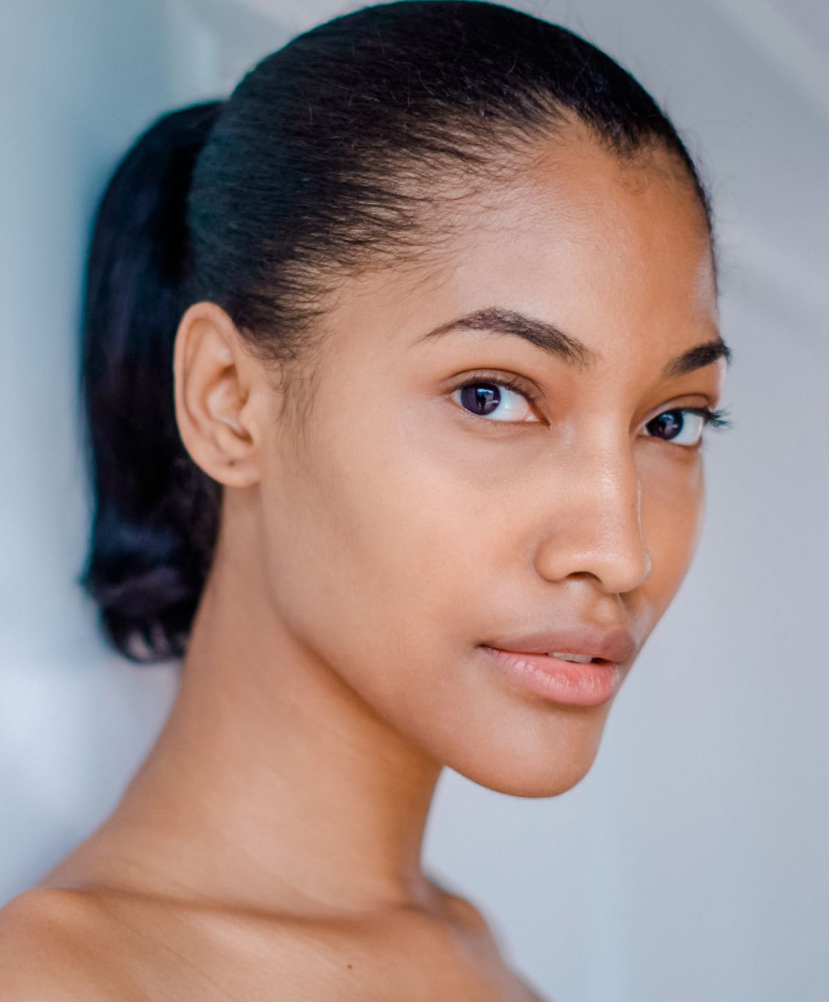 Portrait of a Newport Beach otoplasty model with natural makeup.